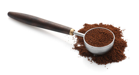 Ground coffee in scoop isolated on white