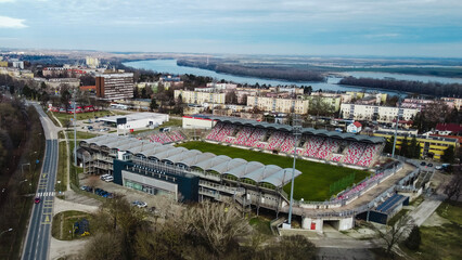 Obraz premium Aerial view of Dunaújváros industrial zone and steel plant with pipeline system in winter
