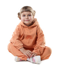 Fashion. Cute little girl in stylish outfit on white background