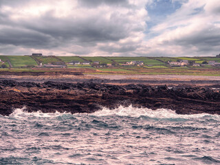 Ocean waves and dark stormy sky. Powerful nature scene showing the power of water.