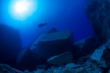 Scuba Diver Exploring Collapsed Azure Window Dive Site, Gozo, Malta