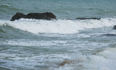 Fototapeta premium High surge of the ocean. Big waves during the monsoon particularly during the Northeast Monsoon november till march in Malaysia and South Asia