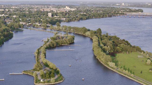 Aerial view of Rene-Levesque Park lighthouse peninsula in Lachine, Montreal along St Lawrence River at sunset. g.