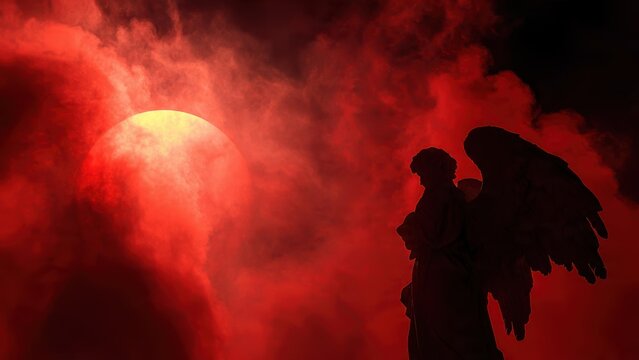 Silhouette of angel against dramatic red sky with sun and clouds