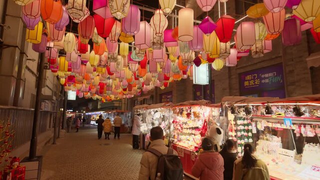 Beijing Spring Festival Night: Festive lanterns and Year of the Horse celebrations on Qianmen Street, featuring traditional colorful lanterns and poetic light displays