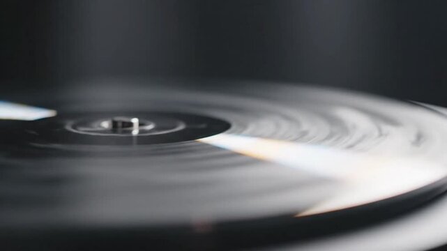 Spinning compact disc. Vintage cd player. Portable CD Player Retro Style. Close-up of rotating cd. 90s Nostalgia Music Device. Classic Audio Technology Gadget. Black shiny disc. Blur