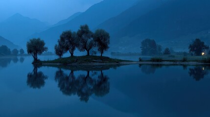 Tranquil lake scene with trees reflecting on water at dusk under a moody sky