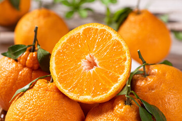 fresh ponkans tangerines on wooden table.