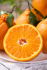 fresh ponkans tangerines on wooden table.