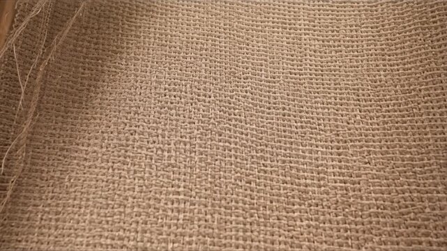 Closeup of burlap fabric texture background.
