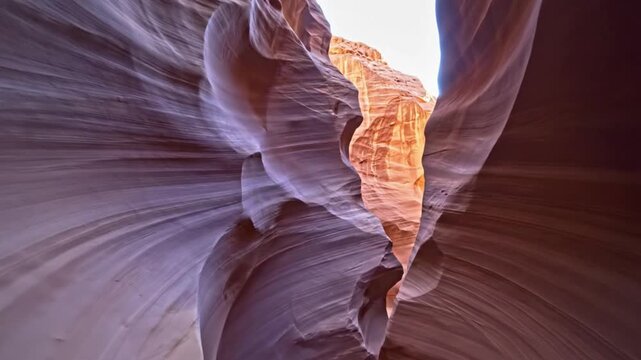 Unique sandstone formations in antelope canyon with vibrant colors and abstract shapes creating a visually striking experience for visitors and photographers.