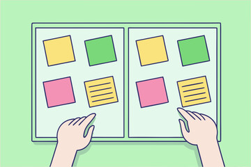 hands arranging colorful sticky notes