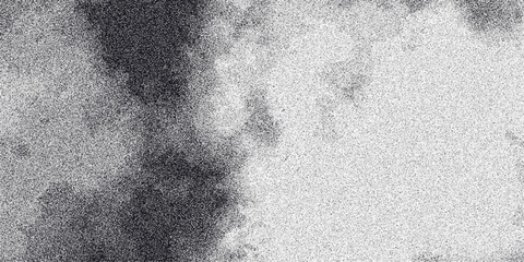 Split monochrome abstract background with a dark textured area on the left transitioning to a lighter speckled area on the right, offering a dramatic contrast for design elements and visual