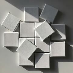 Array of Square White Canvas Boards Under the Morning Sun, Artistic Layout