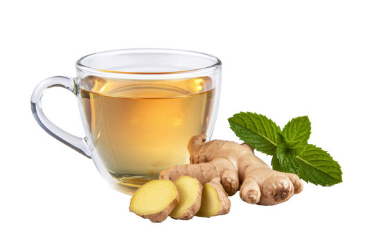 ginger tea in a glass cup with fresh mint and ginger.