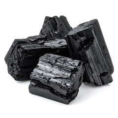 Close-up of glossy, faceted minerals clustered on a stark white surface. The smooth, obsidian-like pieces have a deep black hue