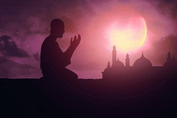 Silhouette of muslim man praying at blue night sky with stars and moon, eid adha mubarak concept
