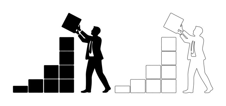 Businessman stacking blocks to build a career or project with determination