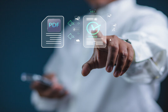 A businessman working with laptops, digital documents, checklist interfaces, and document management processes for quality control approval, data organization, a paperless office, and business process