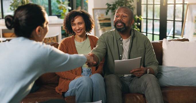 Documents, handshake or meeting with couple and financial advisor in home living room for agreement. Consulting, thank you or welcome and mature people shaking hands with finance broker for deal