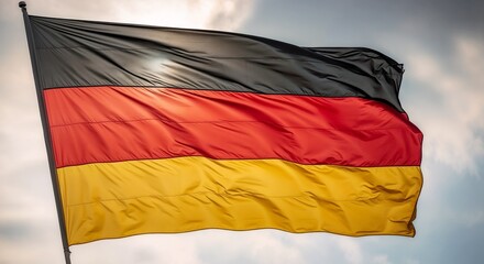 The national flag of Germany waving in the wind. Black, red, and gold horizontal stripes with detailed textile texture. European unity.