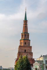 Obraz premium The ancient leaning red brick Syuyumbike Tower on the territory of the Kazan Kremlin. Russia