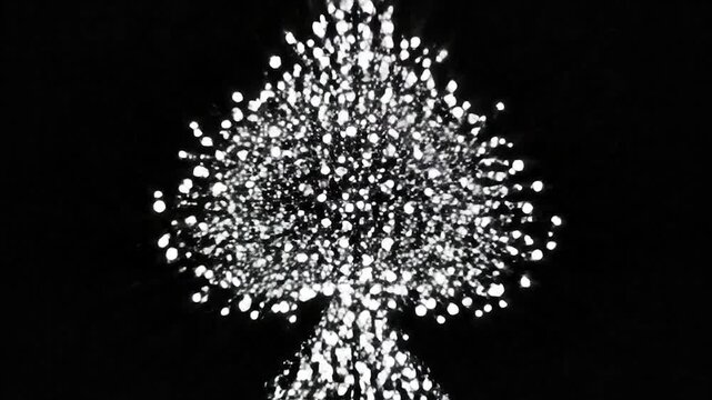 Digital animation of a spade symbol revealing with light rays