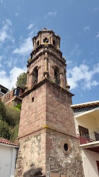 Stone tower on Janitzio Island with clear sky and bright mood