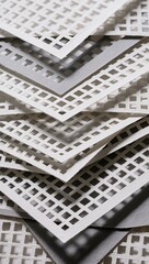 Stacked white lattice paper sheets creating layered shadow abstract geometric background texture.