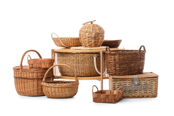 Obraz premium Coffee table and different wicker baskets isolated on white background