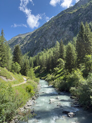 Obraz premium Mountain landscape on a hiking trail formed by Rutor glacier, La Thuile, Aosta Valley, Italy