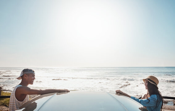Car, couple and happy on road trip at beach for travel adventure, ocean fresh air and bonding. Mockup space, people or journey pause at vehicle for sightseeing, summer getaway or healthy relationship