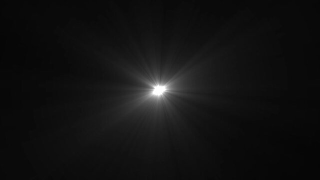 Shining star and light rays motion graphics on black screen chroma key alpha channel background. High quality stock footage of sun rays light effects