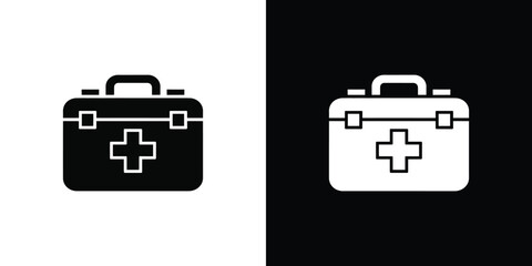 Fototapeta premium Black and white first aid kit on contrasting backgrounds