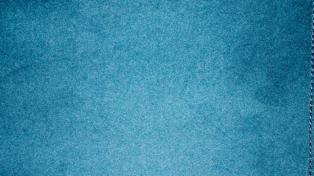A high-quality close-up of a vibrant blue fabric texture with a soft, matte finish and subtle grain. Ideal for upholstery, fashion design backgrounds, and realistic textile 3D mapping.