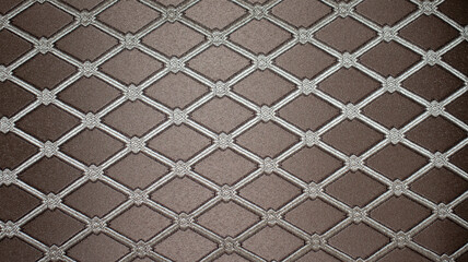 Fototapeta premium High-quality brown quilted fabric texture featuring a decorative diamond geometric pattern with elegant stitching, perfect for luxury furniture upholstery and interior design backgrounds.