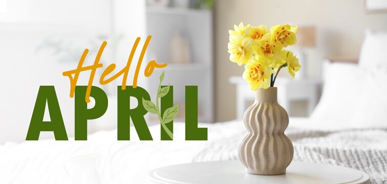 Vase with bouquet of narcissus flowers on bedside table in bedroom. Hello April