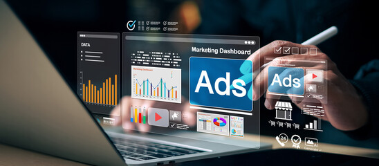 Digital marketing dashboard interface with online ads analytics, performance charts, and data visualization on virtual screen. Concept of advertising strategy.