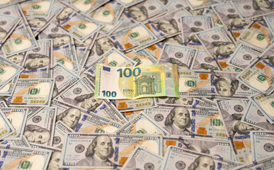 Obraz premium Euro and US dollar currency comparison concept. Dollars vs Euro currency. Financial success in USD and EU currency. Hundred dollar and euro bills background. Income and financial strategy.
