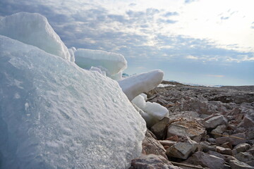 Hummocks on the Kapchagai reservoir. Ice blocks covering the lake. Winter time.
