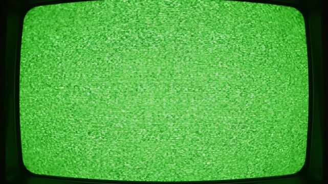 Vintage green screen static displaying analog signal interference and retro cathode ray tube television noise, a captivating visual for digital