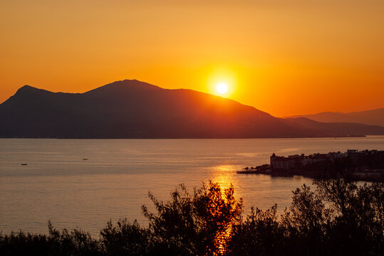 Golden Sunset Over the Euboean Gulf and Mountains in Edipsos, Evia, Greece