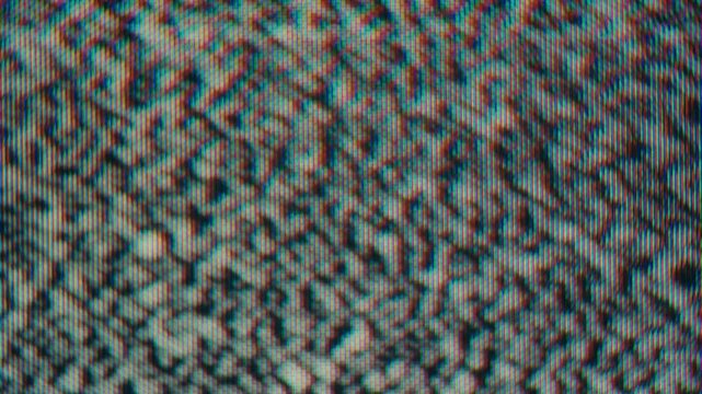 Retro TV frame background with caption text and analog distortion.