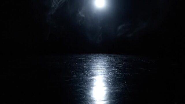Low-lying thick white dry ice smoke billows intensely across a reflective surface, dramatically illuminated by a powerful, centralized overhead light against a completely dark background.