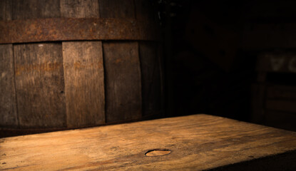 Vintage barrel backdrop with weathered table, soft warm light, rustic tavern atmosphere, textured wood planks and deep shadow