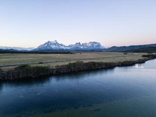 Torres del Paine, Chile: Dramatic view of the Serrano river by Torres del Paine National park of Patagonia, Chile with Cordillera del Paine in the background at sunset