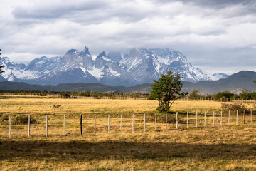 Torres del Paine, Chile: Dramatic view of the famous Torres del Paine mountain range on a cloudy day in Patagonia in Chile in south America