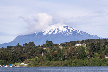 Puerto Varas, Chile: Luxury residence by Lake Llanquihue with the snow covered Calbuco volcano in Puerto Varas, Los Lagos of Chile.