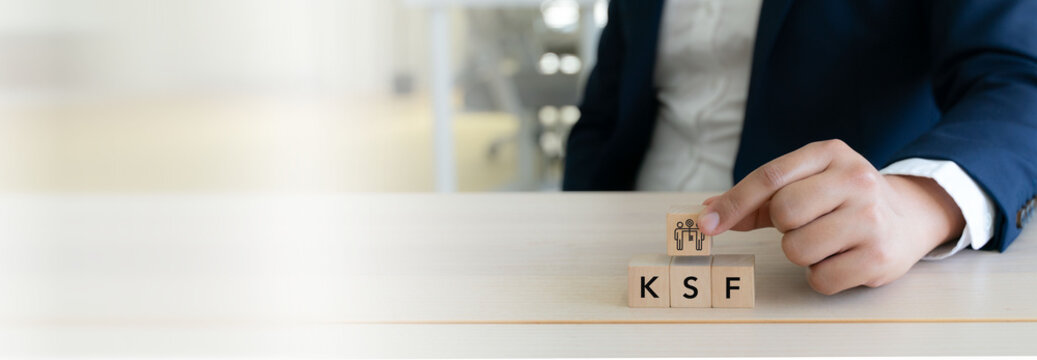 Key Success Factors (KSF) in Business Strategy. Wooden blocks labeled KSF with key success factors icon, symbolizing key success factors, strategic focus and business performance alignment.