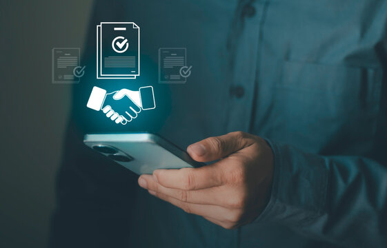 The digital procurement process on smartphones, agreements, invoices, and contracts. Online agreements used to achieve the goals. The concept of digital contract approval.